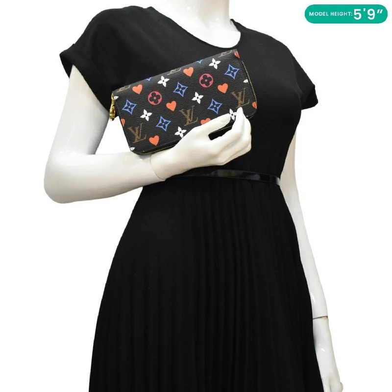 Louis Vuitton Twist bags with a contrast - colored interior for visual interestLOUIS VUITTON Game On Multicolor Monogram Canvas Zippy Wallet Black