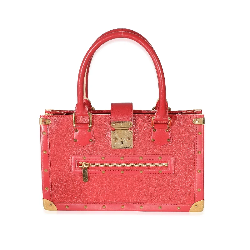 Louis Vuitton crossbody bags in a bold red color for a statementLOUIS VUITTON Geranium Leather Suhali Le Fabuleux