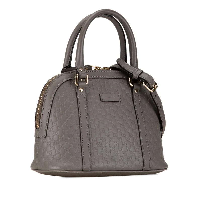 Gucci Marmont bags for women with a snakeskin - effect panelGucci Mini Microguccissima Dome Satchel UUwiLT)