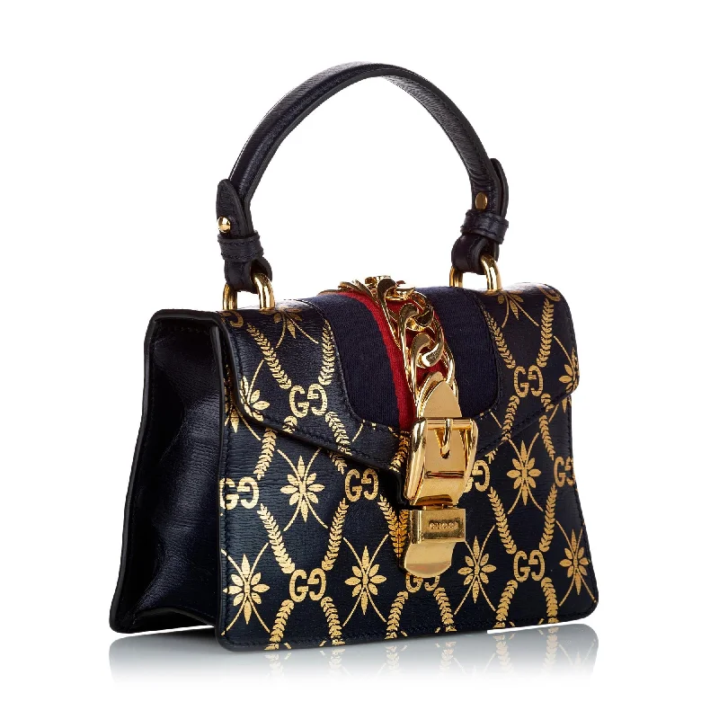 Gucci Marmont bags for women with gold - toned hardwareGucci Mini Sylvie Leather Satchel (30466)