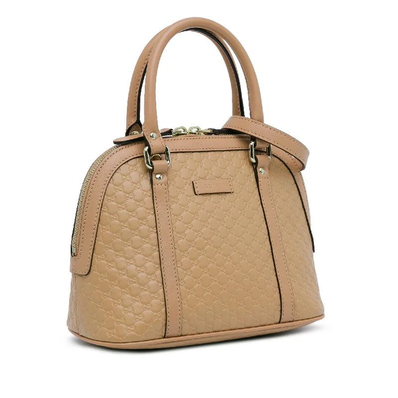 Gucci Marmont bags for women with quilted leather exteriorsGucci Mini Microguccissima Dome Bag P5WWgu)