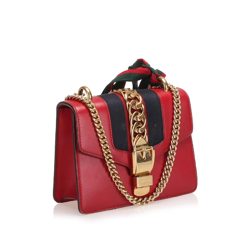 Women Gucci bags with a magnetic snap closure for easy accessGucci Mini Sylvie Leather Chain Shoulder Bag (22101)