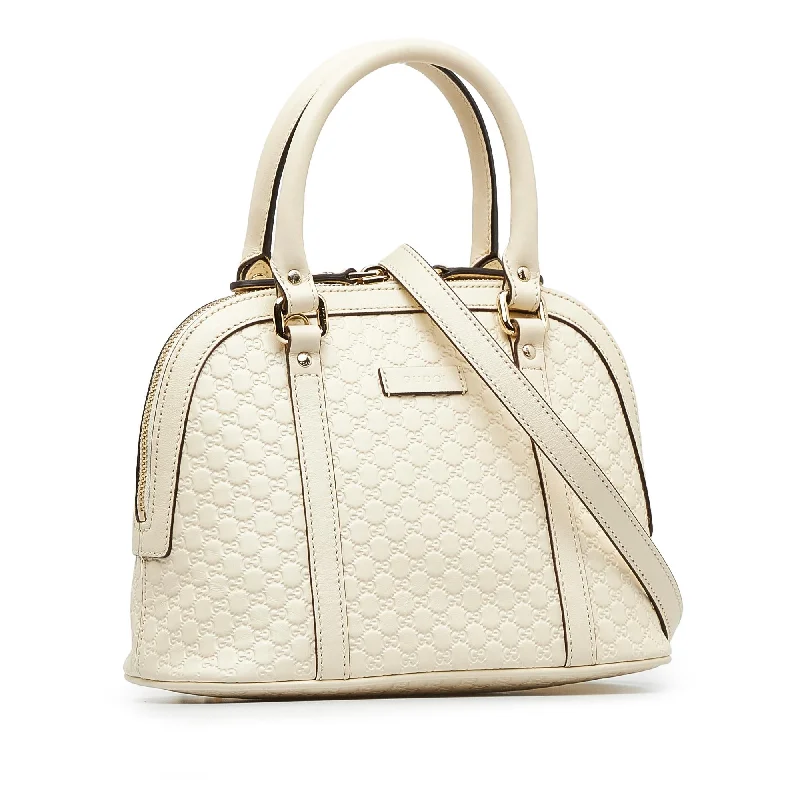 Women Gucci Sylvie bags with a monogram - embossed leatherGucci Mini Microguccissima Dome Satchel (ZGLYfV)