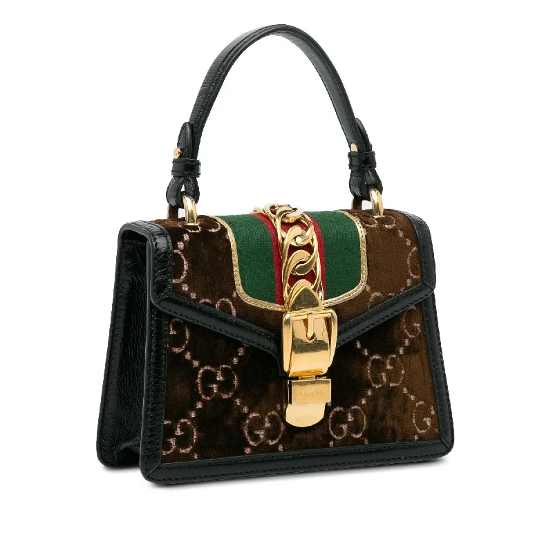 Gucci backpacks for women with a multi - pocket designGucci Mini GG Velvet Sylvie Satchel (f0os8k)