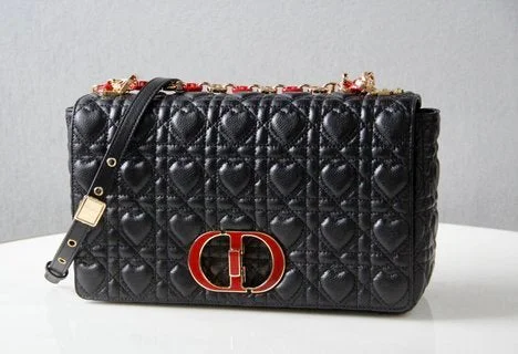 Christian Dior handbags with a snap - button closure and a decorative buckleChristian Dior Bags - 5489